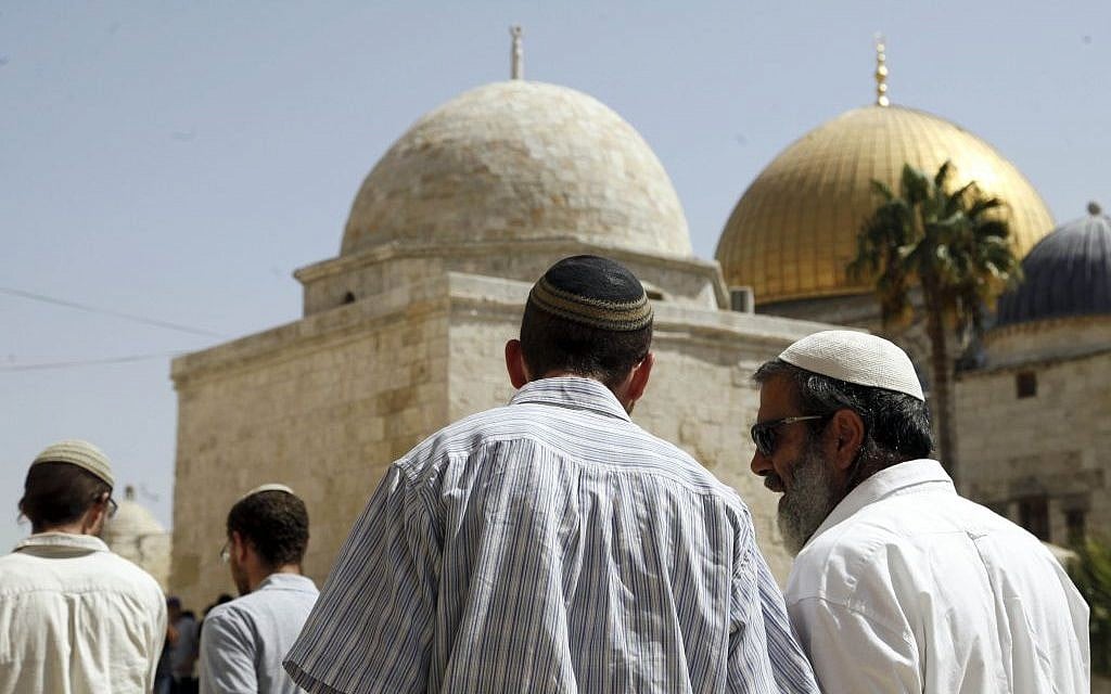 In this Thursday, July 28, 2015 photo, a group of religious Jews walk in front of the Dome of the Rock on Jerusalem's Temple Mount. (AP/Mahmoud Illean) In this Thursday, July 28, 2015 photo, a group of religious Jews walk in front of the Dome of the Rock on Jerusalem's Temple Mount. (AP/Mahmoud Illean)