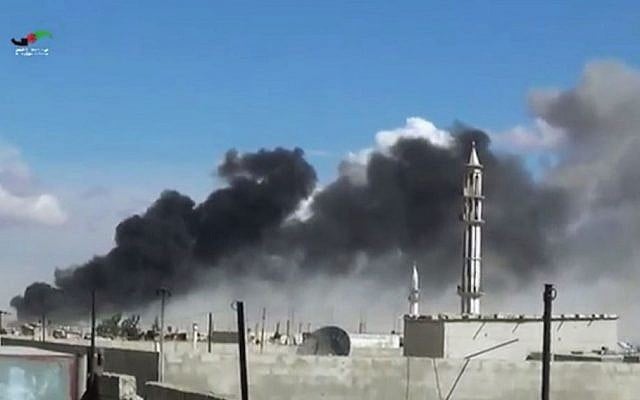 Illustrative image of airstrikes on the town of Talbiseh in the Homs province, western Syria, September 30, 2015. (Homs Media Centre via AP) Illustrative image of airstrikes on the town of Talbiseh in the Homs province, western Syria, September 30, 2015. (Homs Media Centre via AP)
