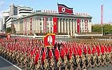The portrait of late North Korea's founder Kim Il Sung is held aloft during a parade marking the 70th anniversary of the country's ruling party in Pyongyang, October 10, 2015 (KRT via AP Video)