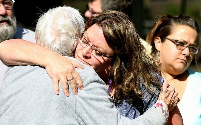 Friends and family are reunited with students at the local fairgrounds after a deadly shooting at Umpqua Community College, in Roseburg, Oregon, Thursday, October 1, 2015. (AP/Ryan Kang) Friends and family are reunited with students at the local fairgrounds after a deadly shooting at Umpqua Community College, in Roseburg, Oregon, Thursday, October 1, 2015. (AP/Ryan Kang)
