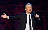 In this Feb. 28, 2015 file photo, Jon Stewart appears onstage at Comedy Central's "Night of Too Many Stars: America Comes Together for Autism Programs" at the Beacon Theatre in New York. (Charles Sykes/Invision/AP, File)