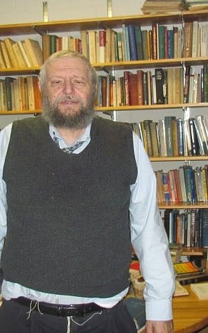 Richard Sugarman, a professor of Jewish philosophy and a close friend of Bernie Sanders, in his University of Vermont office, October 15, 2015. (Ron Kampeas/JTA)