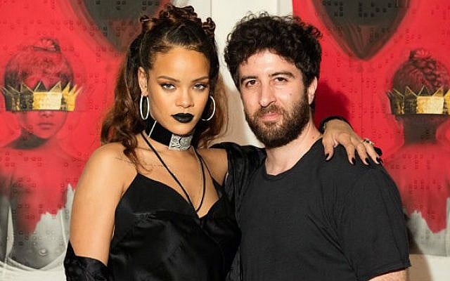 Pop star Rihanna and her Israeli-born muse, Roy Nachum pose in front of the art he created for her latest album (Courtesy Roy Nachum) Pop star Rihanna and her Israeli-born muse, Roy Nachum pose in front of the art he created for her latest album (Courtesy Roy Nachum)