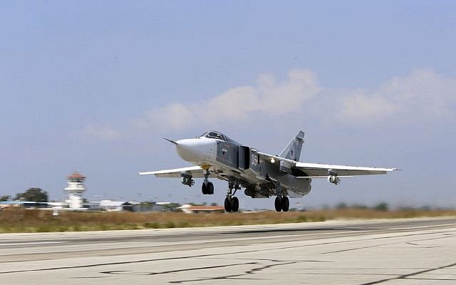 In this photo taken on Saturday, Oct. 3, 2015, Russian SU-24M jet fighter armed with laser guided bombs takes off from a runaway at Hmeimim airbase in Syria. (AP Photo/Alexander Kots, Komsomolskaya Pravda) In this photo taken on Saturday, Oct. 3, 2015, Russian SU-24M jet fighter armed with laser guided bombs takes off from a runaway at Hmeimim airbase in Syria. (AP Photo/Alexander Kots, Komsomolskaya Pravda)