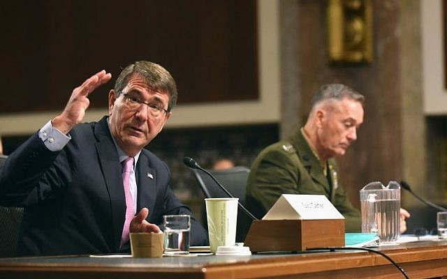 Defense Secretary Ash Carter, accompanied by Joint Chiefs Chairman Gen. Joseph Dunford, testifies on Capitol Hill in Washington, Tuesday, Oct. 27, 2015, before the Senate Armed Services Committee. (AP Photo/Kevin Wolf) Defense Secretary Ash Carter, accompanied by Joint Chiefs Chairman Gen. Joseph Dunford, testifies on Capitol Hill in Washington, Tuesday, Oct. 27, 2015, before the Senate Armed Services Committee. (AP Photo/Kevin Wolf)