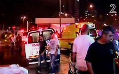 Paramedics responding to a terror attack at the Beersheba Central Bus Station on October 18, 2015. (screen capture: Channel 2)