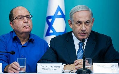 Prime Minister Benjamin Netanyahu (right) with Defense Minister Moshe Ya'alon during a joint press conference at the Prime Minister's Office in Jerusalem regarding the recent wave of terror in Israel, October 8, 2015. (Yonatan Sindel/Flash90)