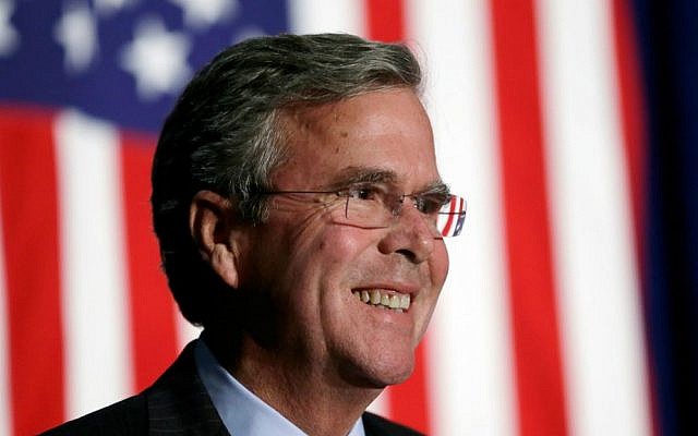 Republican presidential candidate and former Florida Gov. Jeb Bush reacts to a supporter during the Scott County Republican Party's Ronald Reagan Dinner in Davenport, Iowa, Tuesday, October 6, 2015 (AP Photo/Charlie Neibergall, File) Republican presidential candidate and former Florida Gov. Jeb Bush reacts to a supporter during the Scott County Republican Party's Ronald Reagan Dinner in Davenport, Iowa, Tuesday, October 6, 2015 (AP Photo/Charlie Neibergall, File)