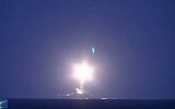 Screen capture from video reportedly showing a Russian ship launching a cruise missile. (YouTube/New China TV)
