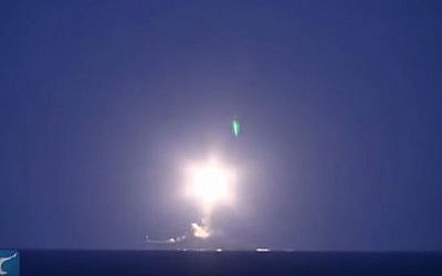 Screen capture from video reportedly showing a Russian ship launching a cruise missile. (YouTube/New China TV)