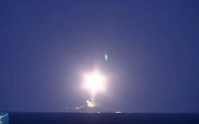 Screen capture from video reportedly showing a Russian ship launching a cruise missile. (YouTube/New China TV) Screen capture from video reportedly showing a Russian ship launching a cruise missile. (YouTube/New China TV)