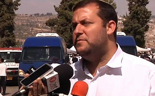 Samaria Regional Council head Yossi Dagan speaks to the media after the funeral of Eitam and Naama Henkin on Friday, October 2, 2015. (Screen capture Channel 2) Samaria Regional Council head Yossi Dagan speaks to the media after the funeral of Eitam and Naama Henkin on Friday, October 2, 2015. (Screen capture Channel 2)