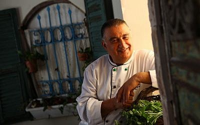 Chef Moshe Basson outside his Eucalyptus Restaurant in Jerusalem. (Liron Almog/Flash 90)