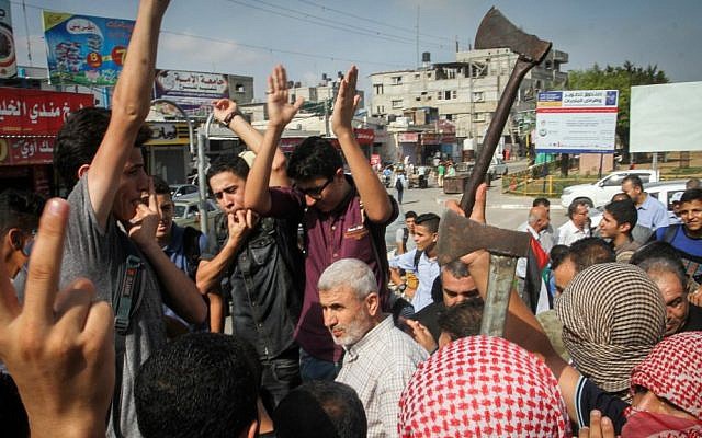 Palestinians take part in an anti-Israel protest in the southern Gaza Strip town of Rafah on October 13, 2015 (Abed Rahim Khatib/Flash90) Palestinians take part in an anti-Israel protest in the southern Gaza Strip town of Rafah on October 13, 2015 (Abed Rahim Khatib/Flash90)