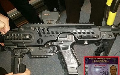 Jerusalem Mayor Nir Barkat's Glock handgun with its conversion kit. Inset: Barkat's gun license. (courtesy)