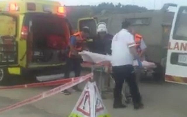 Rescue personnel at the scene of a stabbing attack on an IDF soldier near the checkpoint in the area of Gvaot in the West Bank, on October 23, 2015. (screen capture: Twitter) Rescue personnel at the scene of a stabbing attack on an IDF soldier near the checkpoint in the area of Gvaot in the West Bank, on October 23, 2015. (screen capture: Twitter)