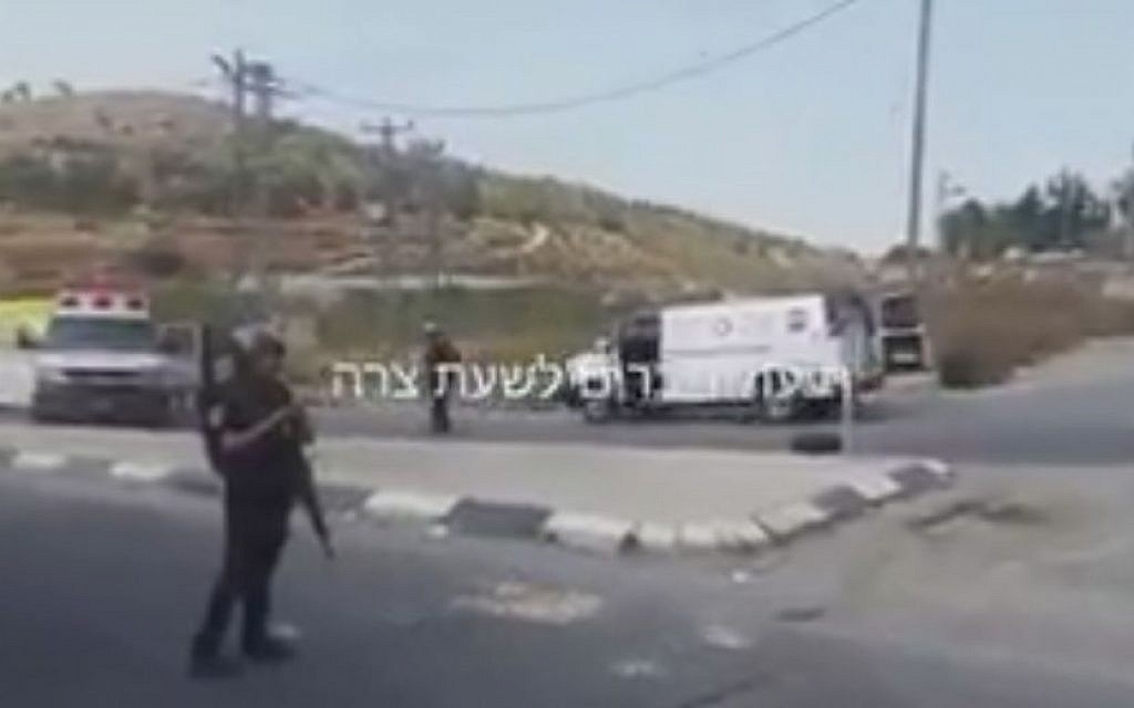 Soldiers and paramedics at the scene of an apparent stoning and hit-and-run attack in the West Bank on October 20, 2015. (Screen capture: Friends in Time of Need/Twitter)