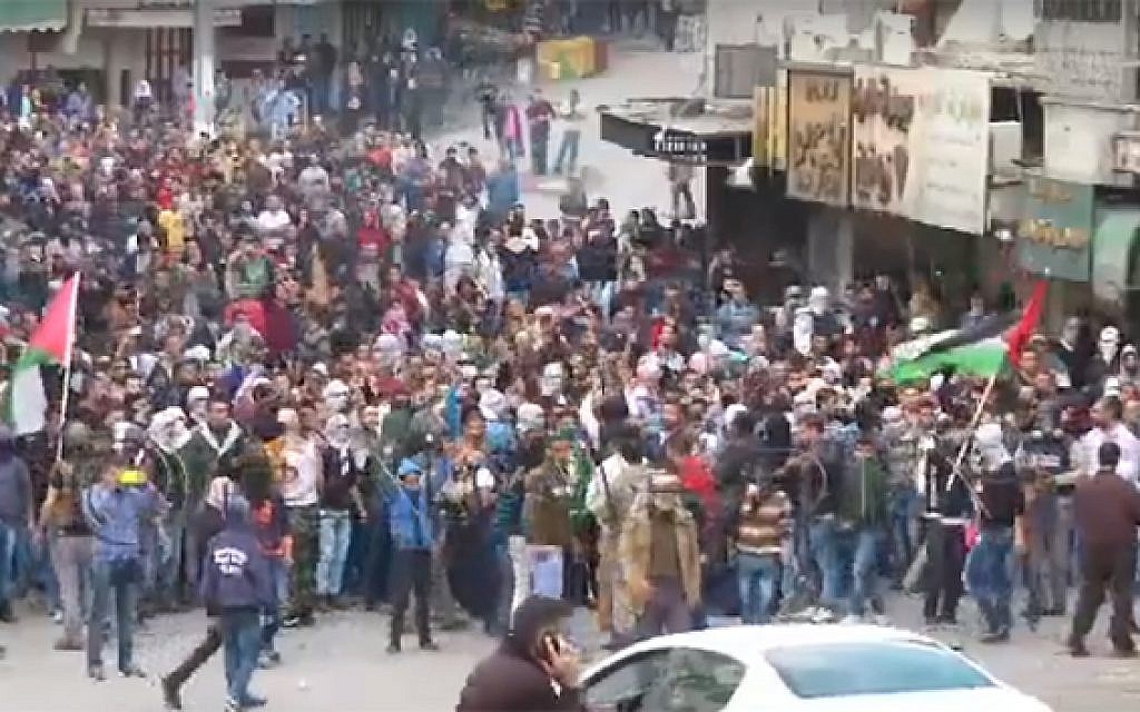 Palestinians protest in the West Bank city of Hebron on October 27, 2015 (screen capture: YouTube) Palestinians protest in the West Bank city of Hebron on October 27, 2015 (screen capture: YouTube)