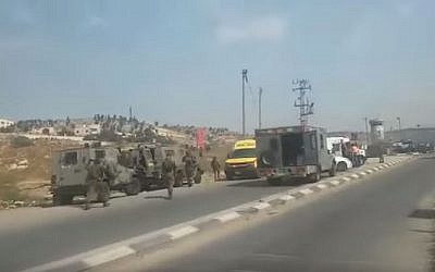 The scene where an Israeli man was killed after being run over by a truck driven by a Palestinian, near the West Bank city of Hebron, October 20, 2015. It was not initially clear if the collision was deliberate or not. (Arutz Sheva TV) The scene where an Israeli man was killed after being run over by a truck driven by a Palestinian, near the West Bank city of Hebron, October 20, 2015. It was not initially clear if the collision was deliberate or not. (Arutz Sheva TV)