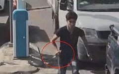 An image from security camera footage showing Muhammad Zakarna, 16,  trying to stab Israeli security personnel before being shot and killed at a checkpoint near Jenin on October 24, 2015. (Screen capture: Channel 2)