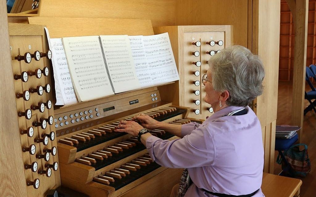 Marybeth Jones at the organ at Brigham Young University’s Jerusalem Center (Shmuel Bar-Am)