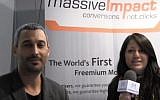 MassiveImpact CEO Sephi Shapira (L) in an interview at Mobile World Congress, February 25, 2013 (Courtesy)