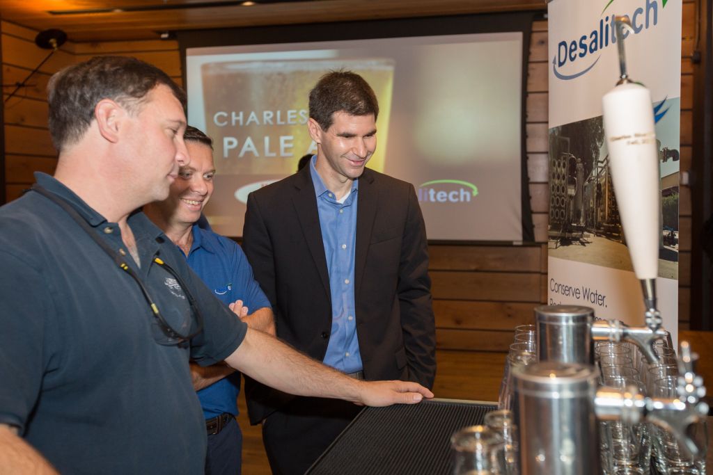 Desalitech CEO Nadav Efraty (right) at the September 30, 2015 launch of Harpoon Brewery's new Charles River Pale Ale, brewed from Charles River water treated by the Israeli-founded Desalitech. (Elan Kawesch/The Times of Israel) Desalitech CEO Nadav Efraty (right) at the September 30, 2015 launch of Harpoon Brewery's new Charles River Pale Ale, brewed from Charles River water treated by the Israeli-founded Desalitech. (Elan Kawesch/The Times of Israel)