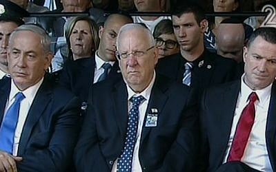 PM Benjamin Netanyahu (left), President Reuven Rivlin (center) and Knesset Speaker Yuli Edelstein attend the memorial service to mark 20 years since the assassination of Yitzhak Rabin (screen capture: Channel2)