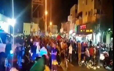 Arab residents of  Jaffa protest amid ongoing Israeli-Palestinian violence, on Tuesday, October 6, 2015 (screen capture: Channel 2)