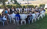 Discussions between Arabs and Jews after a “human chain” event calling for coexistence on October 16, 2015 (JTA/Facebook)