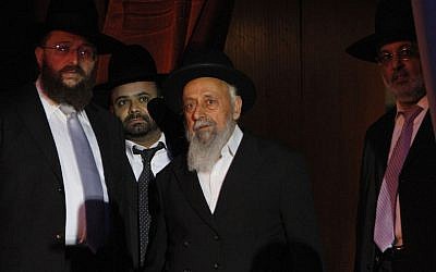 Rabbi Shimon Badani enters the stage of a convention for Jewish religious women held in Jerusalem on June 28, 2010. (Miriam Alster/Flash90)