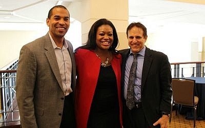 Illustrative: Steve Gutow, right, with Michele Jawando, vice president of legal process at the Center for American Progress, and her husband, Will Jawando, a Democratic candidate for Congress. Michele Jawando took part in an October 12 discussion about race relations organized by the Jewish Community Relations Council of St. Louis. (Jewish Council for Public Affairs/via JTA)