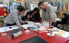Tovanot kids at work at Herzog High School, Holon (Courtesy)