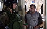 Sheikh Hassan Yousef is arrested in his home by IDF troops, October 20, 2015. (Screen capture from YouTube)