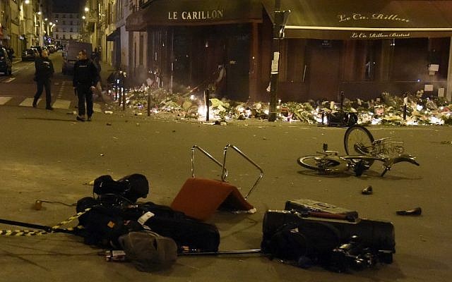 Abandoned items cover the streets around the "Le petit Carillon" restaurant, one of the site of the attacks in Paris on November 15, 2015, in the 10th district of Paris. (AFP PHOTO / DOMINIQUE FAGET) Abandoned items cover the streets around the "Le petit Carillon" restaurant, one of the site of the attacks in Paris on November 15, 2015, in the 10th district of Paris. (AFP PHOTO / DOMINIQUE FAGET)