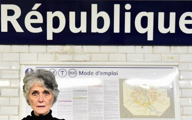 A woman observes a minute of silence, on November 16, 2015 at Republique subway station in Paris, to pay tribute to victims of the attacks claimed by Islamic State which killed at least 129 people and left more than 350 injured on November 13. (AFP Photo/Loic Venance) A woman observes a minute of silence, on November 16, 2015 at Republique subway station in Paris, to pay tribute to victims of the attacks claimed by Islamic State which killed at least 129 people and left more than 350 injured on November 13. (AFP Photo/Loic Venance)