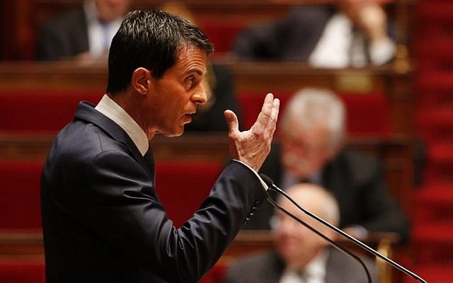 French Prime Minister Manuel Valls gestures as he addresses French lawmakers debating a measure that would extend a state of emergency declared by the French president until the end of February, at the National Assembly in Paris on November 19, 2015. (Francois Guillot/AFP) French Prime Minister Manuel Valls gestures as he addresses French lawmakers debating a measure that would extend a state of emergency declared by the French president until the end of February, at the National Assembly in Paris on November 19, 2015. (Francois Guillot/AFP)