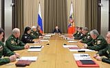 Russian President Vladimir Putin (C) chairs a meeting on the development of Russia's armed forces at the Bocharov Ruchei state residence in Sochi on November 13, 2015. (Alexei Druzhinin/AFP/RIA NOVOSTI)