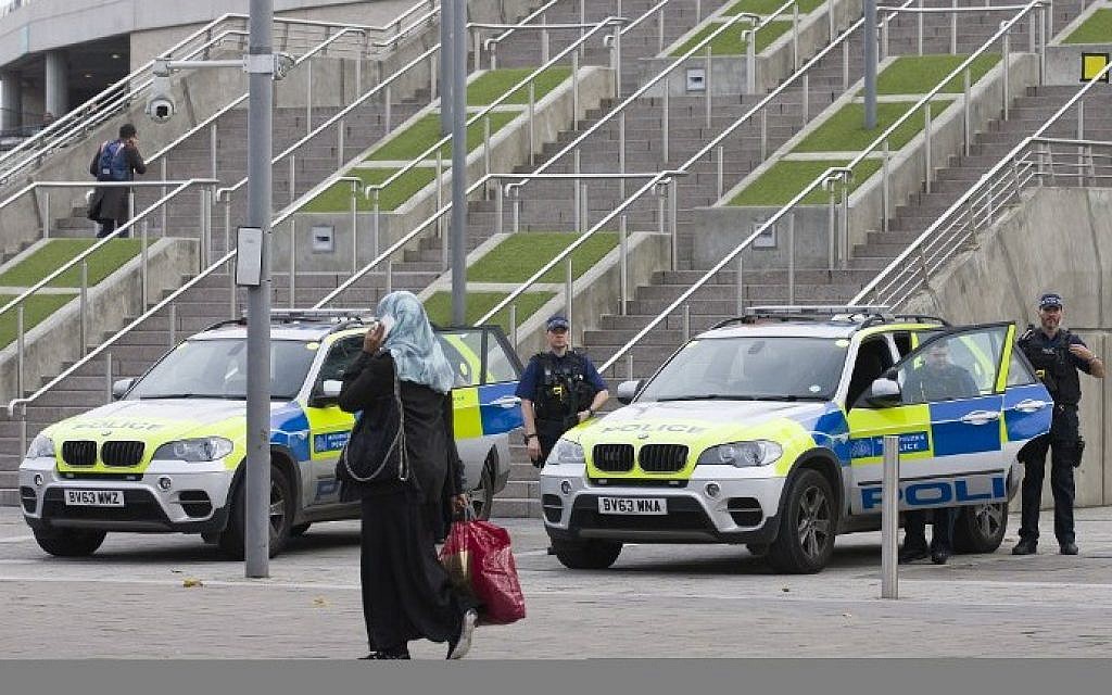 Armed British police officers stand guard outside Wembley Stadium in west London, on November 17, 2015, ahead of the international friendly football match between England and France later in the day. (Justin Tallis/AFP)