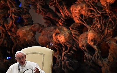 Pope Francis speaks during an audience to participants at the conference "Educating today and tomorrow" at the Paul VI audience hall, November 21, 2015 at the Vatican. (AFP/GABRIEL BOUYS)