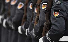 Illustrative: German Bundeswehr soldiers of an honor guard are pictured during a welcoming ceremony at the Defense Ministry in Berlin November 27, 2015. (AFP/TOBIAS SCHWARZ)