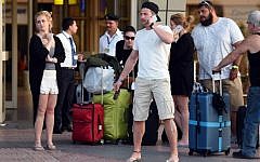 British tourists arrive at the airport in Egypt's Red Sea resort of Sharm el-Sheikh on November 6, 2015. (Mohamed el-Shahed/AFP)