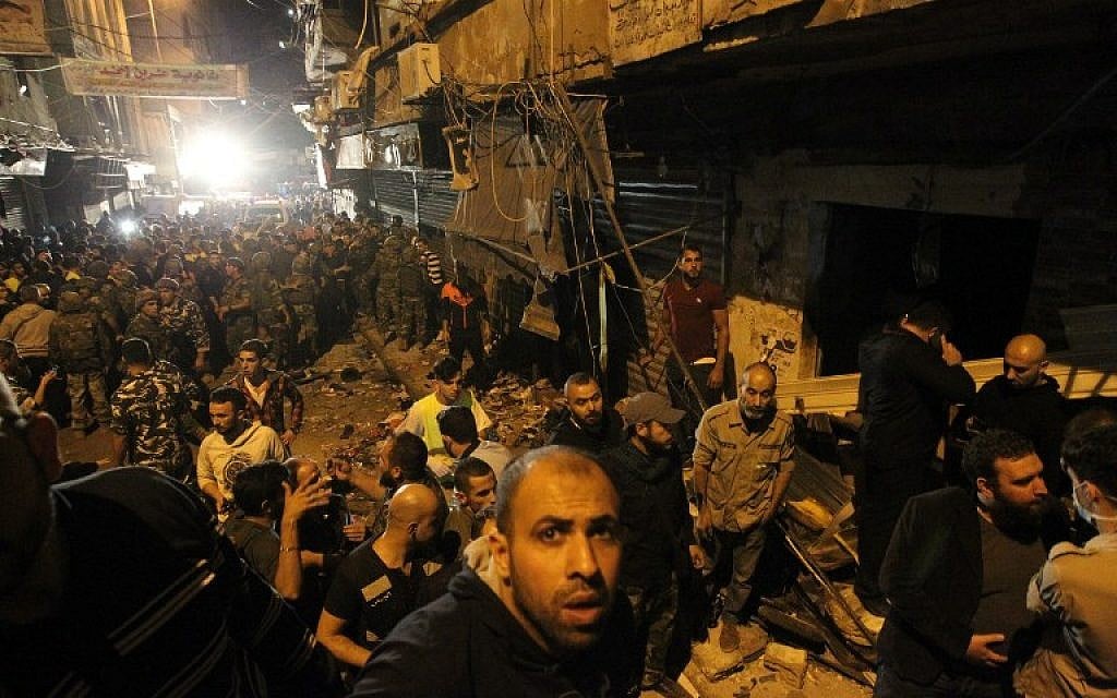 Emergency personnel gather at the site of a twin suicide bombing in Burj al-Barajneh, in the southern suburbs of the capital Beirut on November 12, 2015 (AFP PHOTO/ANWAR AMRO)