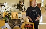 Joel Laloux, the former owner of Paris' Bataclan theatre from 1976 to September 2015, speaks from his home in the Israeli Mediterranean coastal city of Ashdod, on November 18, 2015. (AFP PHOTO/JACK GUEZ)