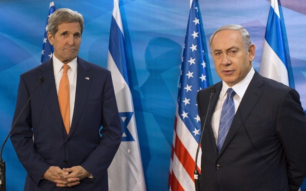 Prime Minister Benjamin Netanyahu, right, and US Secretary of State John Kerry speak to the press during a meeting at the Prime Minister's Office in Jerusalem, November 24, 2015. (AFP/Pool/Atef Safadi)