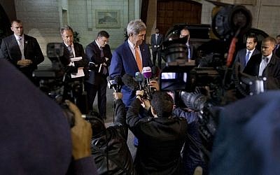 US Secretary of State John Kerry speaks to members of the media after meeting with Palestinian president Mahmud Abbas in the West Bank city of Ramallah on November 24, 2015. (Jacquelyn Martin/AFP/Pool)