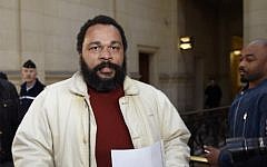 Controversial comic Dieudonne M'bala M'bala arriving at a Paris courthouse,  March 12, 2015. (AFP PHOTO / LOIC VENANCE)