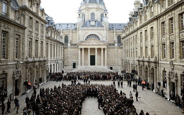 (From C-L) French Minister for Higher Education and Research Thierry Mandon, French Education Minister Najat Vallaud-Belkacem, French President Francois Hollande and French Prime Minister Manuel Valls observe a minute of silence on November 16, 2015 at the Sorbonne University in Paris to pay tribute to victims of the attacks claimed by Islamic State which killed at least 129 people and left more than 350 injured on November 13. (AFP Photo/Pool/Stephane de Sakutin) (From C-L) French Minister for Higher Education and Research Thierry Mandon, French Education Minister Najat Vallaud-Belkacem, French President Francois Hollande and French Prime Minister Manuel Valls observe a minute of silence on November 16, 2015 at the Sorbonne University in Paris to pay tribute to victims of the attacks claimed by Islamic State which killed at least 129 people and left more than 350 injured on November 13. (AFP Photo/Pool/Stephane de Sakutin)