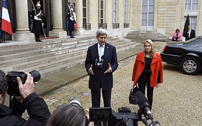 US Secretary of State John Kerry (L) and US Ambassador to France Jane Hartley address reporters following their meeting with the French President at the Elysee palace in Paris on November 17, 2015 (Dominique Faget/AFP)