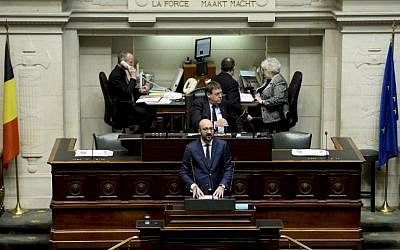 Belgian Prime Minister Charles Michel delivers a speech on the terrorist attacks in Paris at an extra plenary session of the Chamber at the Federal Parliament in Brussels on November 19, 2015. (AFP PHOTO/BELGA/DIRK WAEM)